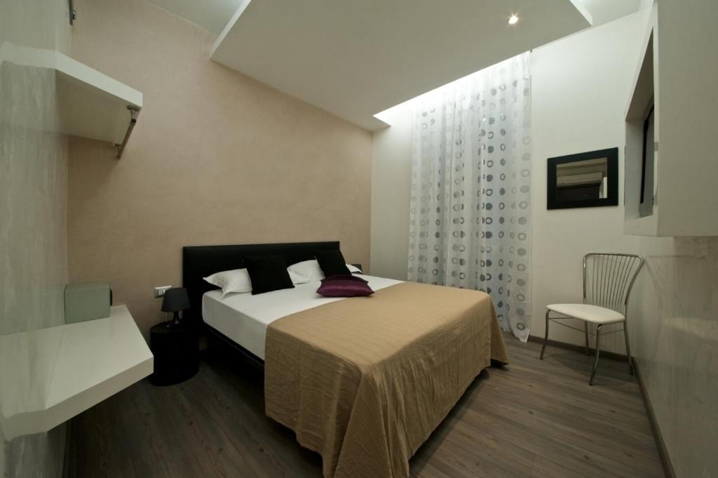 Roma Naif Rooms Rum bild